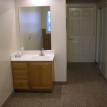 Picture of Bedroom sink, entry, and plant shelf.
